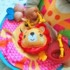 Woopie montessori interaktív oktatószőnyeg - csörgő és rágóka